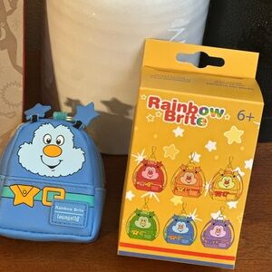Loungefly Rainbow Brite Blue and Yellow opened and unused  mini bag charm.